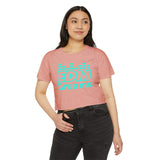 EDM Dreams Flowy Crop Top at Prism Raves: A soft, durable blend of polyester and cotton with a stylish, relaxed fit, raw-edge sleeves, and hems, perfect for festival enthusiasts and rave lovers.