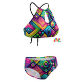 Color Matrix Rave Two-Piece Swimsuit featuring adjustable halter top with open back and padded bra, paired with moderately covered swim briefs, designed for comfort and style at EDM festivals and raves.
