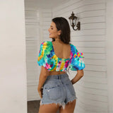Stylish and vibrant Color Swirl Puff Sleeve Feminine Crop Top featuring a square collar and lace-up front detail, designed for a flattering fit. Perfect for pairing with denim shorts or flirty skirts, this tie-dye crop top offers a bold, eye-catching design that enhances any summer or festival outfit