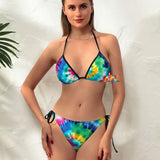 Color Swirl Tie Dye String Bikini featuring adjustable straps and side ties, vibrant tie dye pattern, and low waist design. Perfect for fashion-forward beach-goers seeking a stylish, comfortable, and eye-catching swimwear option for summer activities and pool parties.