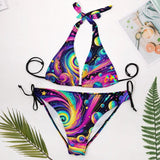 Cosmic Dance Plus Size Rave Bikini adorned with a galaxy planet design in shades of purples, blacks, pinks, and blues. This swimsuit features wide straps, a low-waist triangle bikini top with adjustable neck and middle back ties, and side-tie adjustments on the swim trunks, tailored for a comfortable and stylish experience at any rave or festival event.