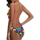A striking Neon Drip Backless Rave One-Piece Swimsuit, showcasing a vivid array of neon colors cascading down the fabric in a drip paint effect, perfectly capturing the lively essence of rave culture. This swimsuit combines bold style with a daring backless design, ideal for festival-goers looking to stand out.