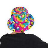 A vibrant PLUR Smiles Bucket Hat featuring a colorful, all-over print of smiley faces and peace symbols, embodying the rave culture's spirit of Peace, Love, Unity, and Respect. The hat is designed to be unisex, showcasing bright, engaging patterns on a soft, comfortable 100% polyester fabric, ideal for festival-goers and ravers looking to add a pop of color and positivity to their outfit.