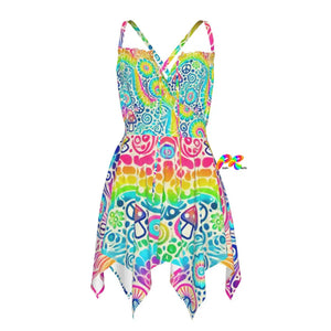 Garden Tie Dye Rave Fairy Dress - Vibrant rainbow colors with an asymmetrical hem, featuring criss-cross straps, fitted at the waist, and a flowy skirt. Ideal for festivals, EDM raves, and pride events, this dress is a stunning and comfortable choice for any rave enthusiast looking to stand out."