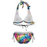 Colorful tie-dye plus size bikini designed for raves, featuring adjustable straps and a vibrant, hippie-inspired pattern. The top is a classic triangle cut, paired with low-rise bottoms, ideal for comfort and style at any festival.
