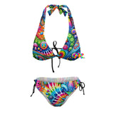 Colorful tie-dye plus size bikini designed for raves, featuring adjustable straps and a vibrant, hippie-inspired pattern. The top is a classic triangle cut, paired with low-rise bottoms, ideal for comfort and style at any festival.