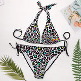 sizes extra large to 4XL Leopard plus size bikini with a white background and black leopard print with pastel colors in the center of each spot, adjustable ties on sides of bottoms Two Piece Plus Size Bikini - Cosplay Moon
