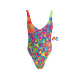 Vibrant Liquid Splatter Rave One-Piece Backless Swimsuit from Prism Raves, highlighting its eye-catching design and sleek backless silhouette, ideal for standout festival and rave fashion.