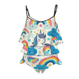 Magical Dreams girls' one-piece ruffle swimsuit featuring a colorful unicorn design, charming ruffles, and adjustable straps, available in various sizes, perfect for fantasy-themed swimwear and poolside fun.