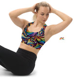 Vibrant longline sports bra featuring a Pride Swirl pattern with an array of vivid colors in swirling designs. The bra offers great support with its compression fabric, double-layered front, and shoulder straps. It's available in a range of sizes, catering to diverse body types. The pattern is dynamic, embodying the spirit of rave culture and energetic movement, making it ideal for both fitness and fashion-forward streetwear.