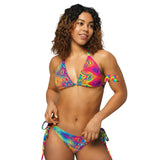 Rave or Festival bikini with wavy colorful pattern Soft and stretchy material with UPF 50+ Sizes up to 6XL Bikini top comes with removable padding for comfort Multiple ways to tie and style the bikini set Radiant Hue Rave Bikini - Cosplay Moon